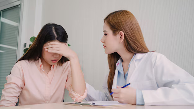 doctor-talking-unhappy-teenage-patient-exam-room_7861-1222.jpg